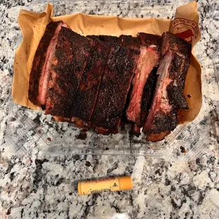 Full order of pork ribs (double layer) . (Chapstick for size comparison)