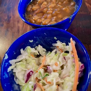 wo bowls of beans and coleslaw