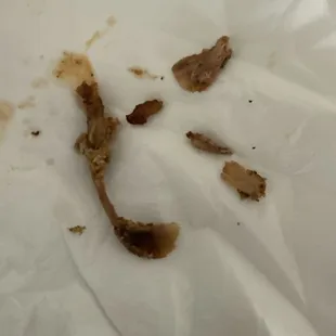 Bones from chicken sandwich.
