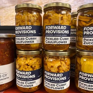 several jars of pickled curdy
