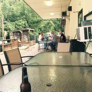 a table with a bottle of beer on it