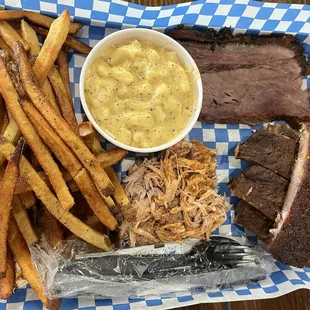 3 meat plate with French fries and Mac N Cheese