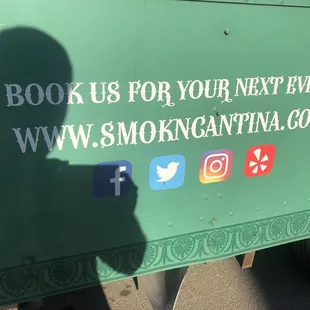 the shadow of a person on the side of a truck