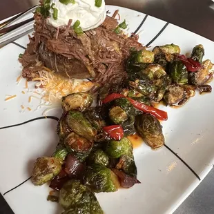 Brisket Stuffed Potato with awesome Signature Crispy Brussel Sprouts!