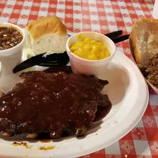 Ribs, chopped brisket sandwich with baked beans and mac-n-cheese.