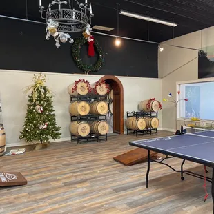 a ping - pong table and barrels