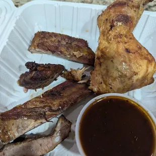 Supposed to be a 1/3 rack of ribs. Barely enough meat to pick. Ended up trashing them. Chicken was average, dry but edible.