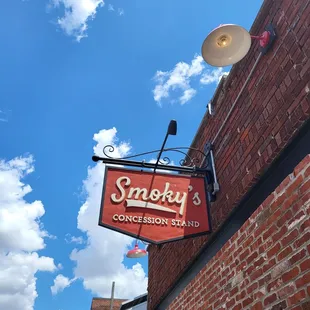 smoke coming out of the sign