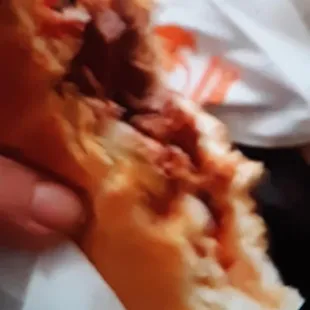 Sliced Brisket Sandwich - their signature sauce, pickles, onions, and 3-4 slices of brisket