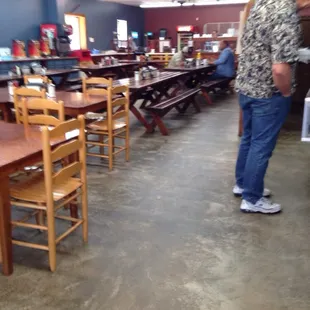 a man standing in a restaurant