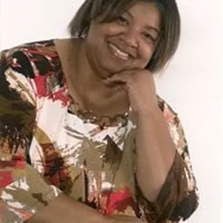 Kim E.