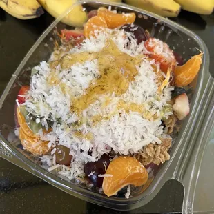 a bowl of fruit and rice