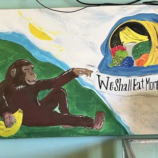 a painting of a monkey sitting on the ground