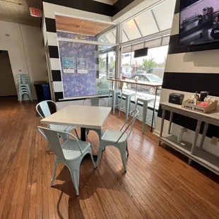 a dining room with a flat screen tv