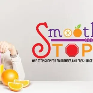 a woman holding a glass of orange juice