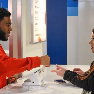 a man and a woman at a counter