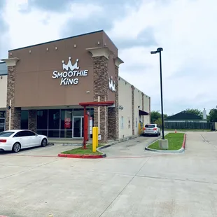 a car parked in front of the store