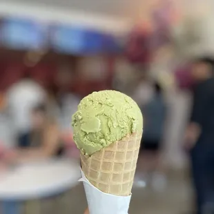 Macha ice cream with waffle cone