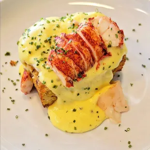 Lobster benedict on a cheddar scallion biscuit