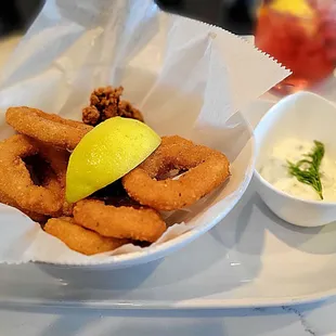 Calamari with tartar sauce and lemon.