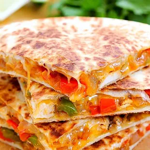 Our delicious chicken or beef quesadillas!