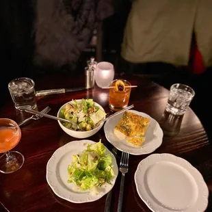 plates of food and drinks on a table