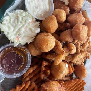 Build your own fried platter with scallops and clam strips, served with hush puppies and sweet potato fries.