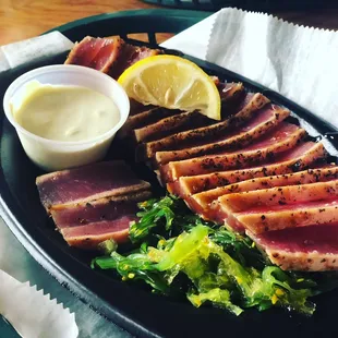 Seared tuna appetizer with wasabi mayo and seaweed salad