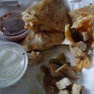Soggy... chicken, onion and peppers not chopped up small, instead huge pieces that fall out before I could get a bite...