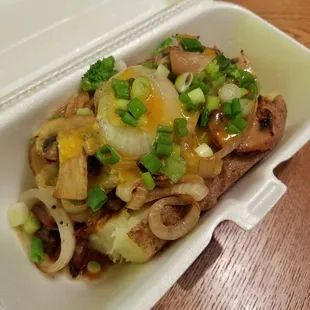 I ordered my Texas Tater topped with brisket, butter, cheese, mushrooms, sautéed onions, broccoli, &amp; chopped green onion.