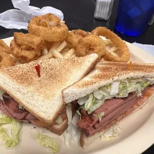 Fried bologna sandwich with half fries and half onion rings