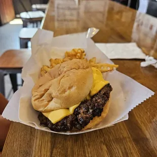 Plain "cheesy burger " and waffle fries