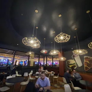 a man sitting at a table in a restaurant