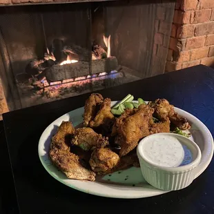 Dry rub wings in the bar area while waiting for a table