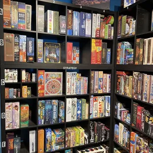 a bookcase full of board games