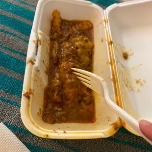 Half eaten chili cheese fries. Peep all the grease