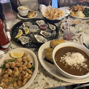 Fried Gater bites, gumbo, oysters, French fries, fried shrimp, crawfish etouffee.