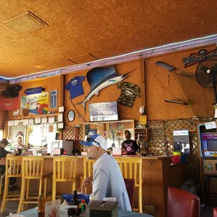 customers sitting at the bar