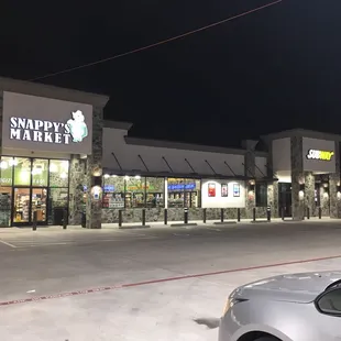 a car parked in front of the store