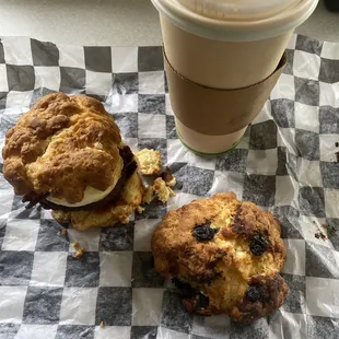 Sammi's egg chesse sausage and bacon biscuit sandwich; red eye coffee and a blueberry biscuit so excited