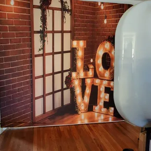 Brick wall love backdrop.