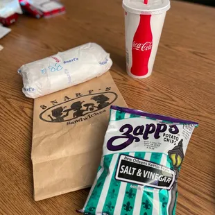 a bag of chips and a drink