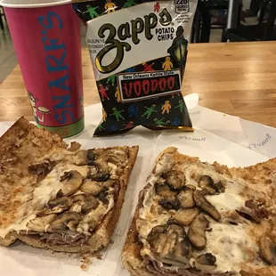 two slices of pizza and a drink