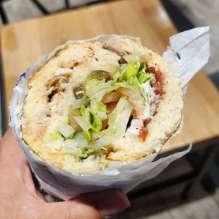 Chicken and Swiss on white bread. Bacon was ~$2