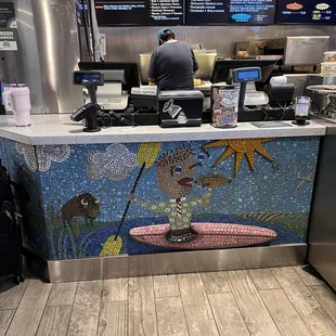 Cool art at the counter (artist unknown)
