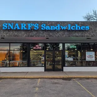 a car parked in front of the store