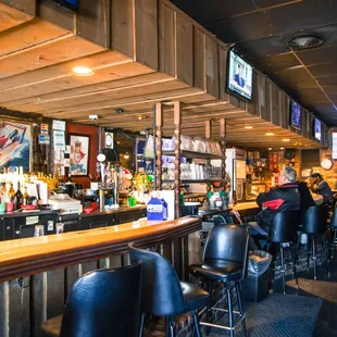 people sitting at the bar