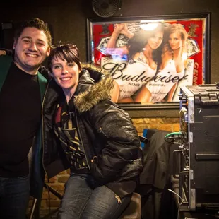 a man and a woman posing for a picture