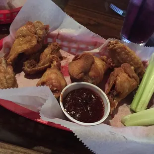 Wings ( was supposed to have Cajun dry rub, cook did not honor that request, they did not offer to fix) Grippo BBQ sauce!
