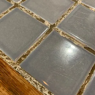 a closeup of a tile floor